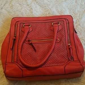 Salmon colored handbag